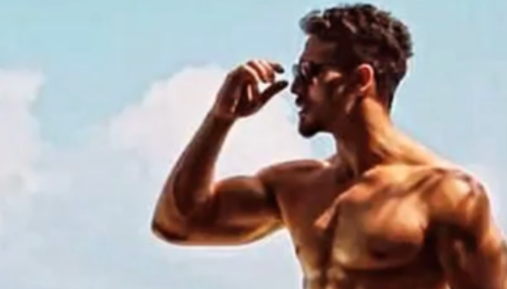 Tiger Shroff flaunts chiselled physique and flashboard abs in stunning beach photo